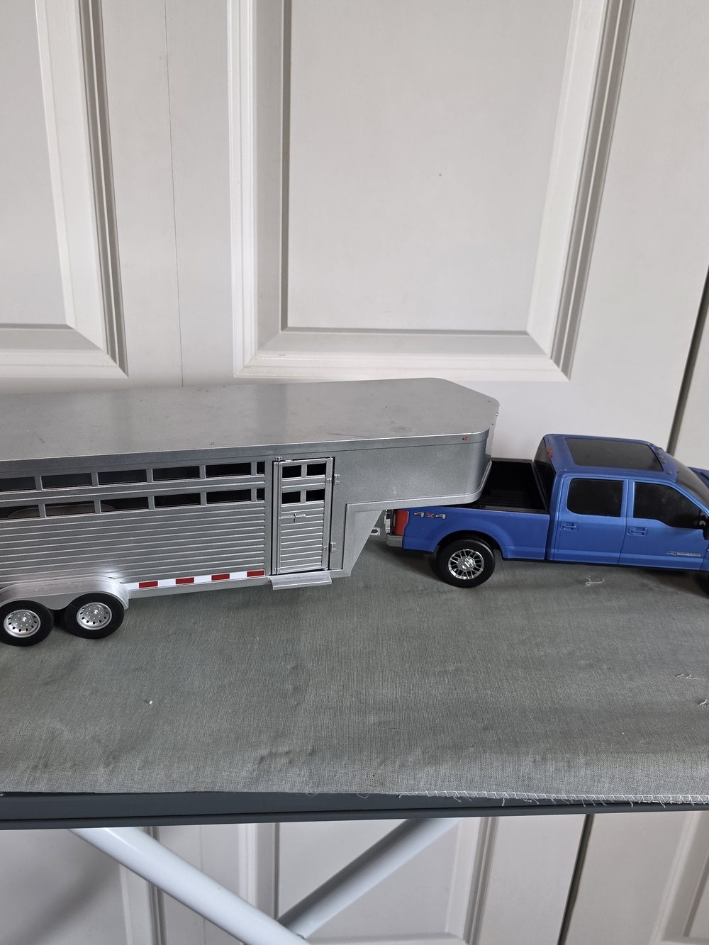Ford Blue Pickup Truck with Silver Livestock Trailer